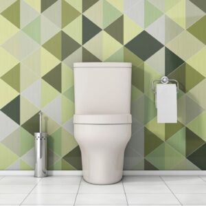 white toilet in a multi-colored bathroom